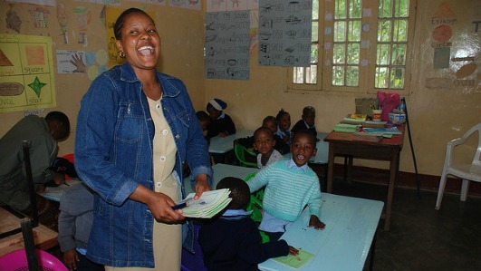 teacher-laughing-with-students