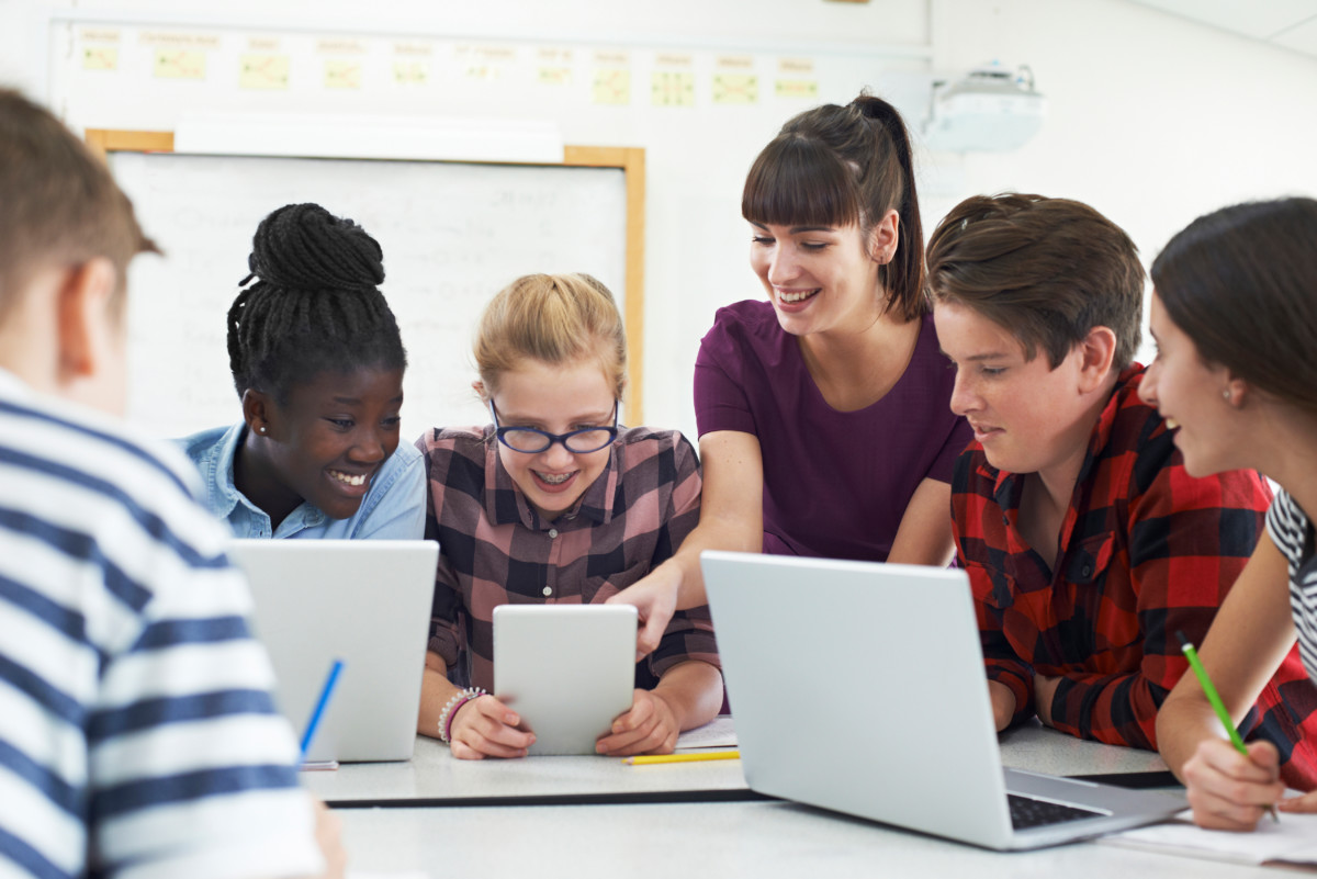 students smiling taking online formative assessment